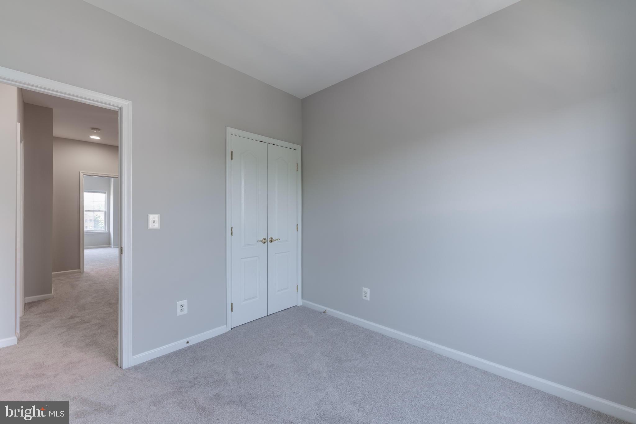 42429 Redstone Terrace Brambleton, VA 20148 - Photo 30 of 35 a view of an empty room and closet