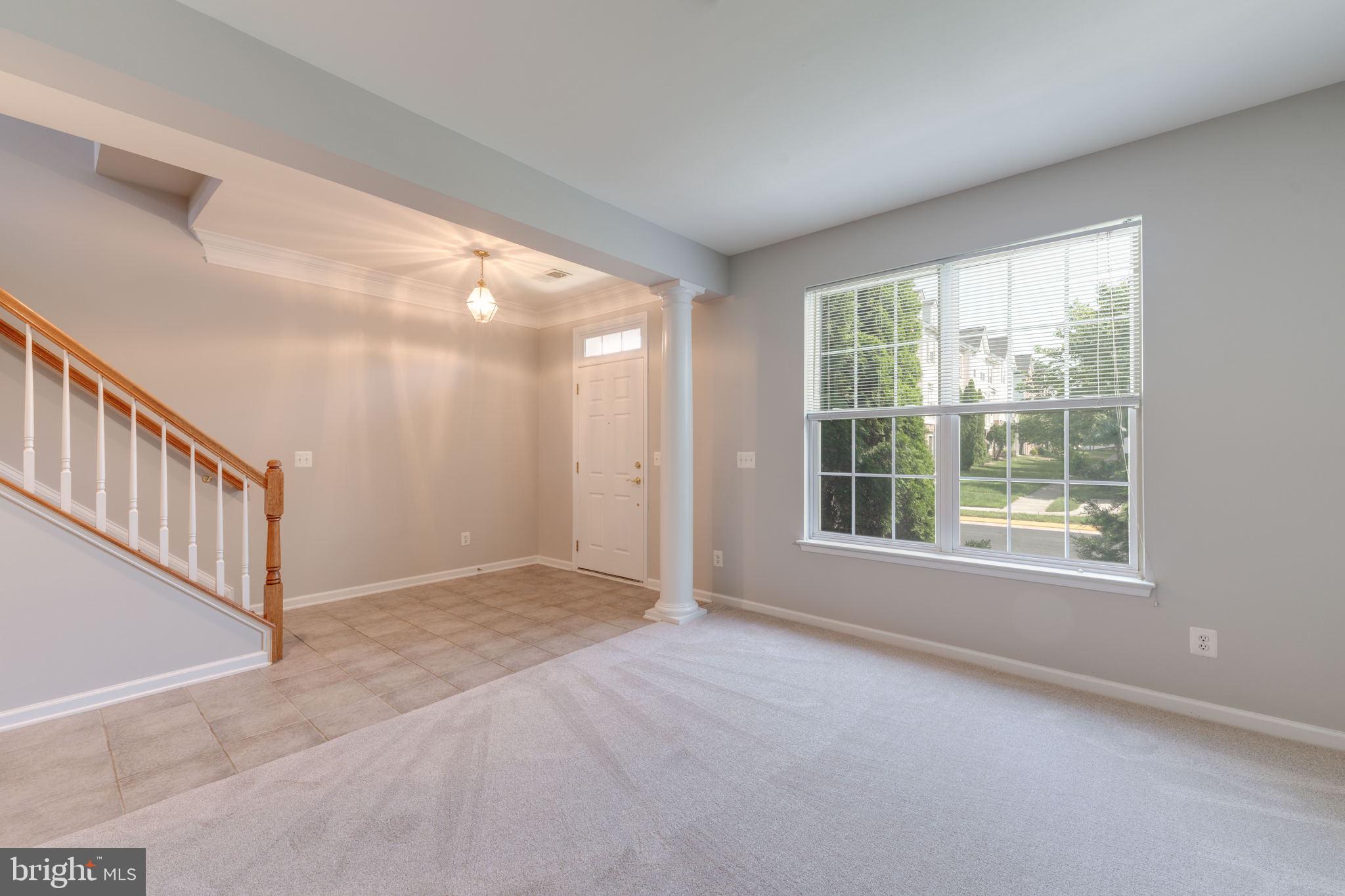 42429 Redstone Terrace Brambleton, VA 20148 - Photo 6 of 35 a view of an empty room with a window