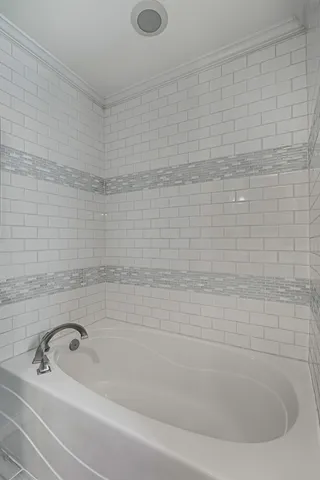 a bathroom with a bathtub