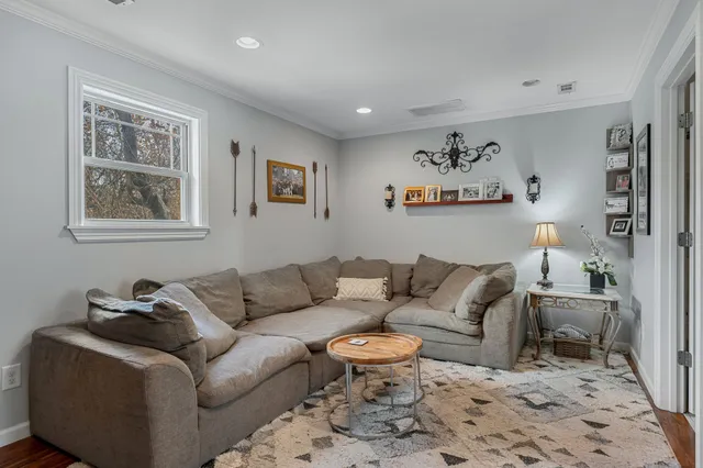 a living room with furniture and a couch