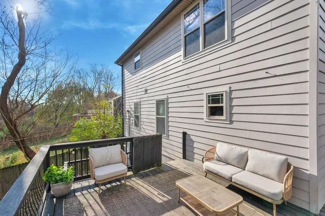 a view of a two chairs in the deck
