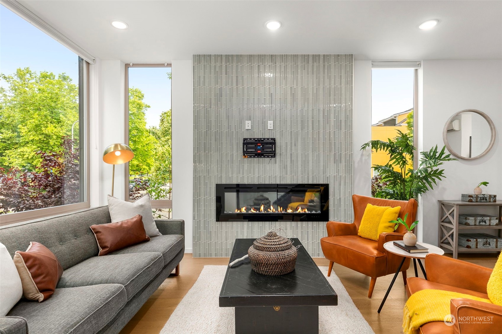 200 20th Avenue South Seattle, WA 98144 - Photo 2 of 22 a living room with furniture potted plant and a fireplace