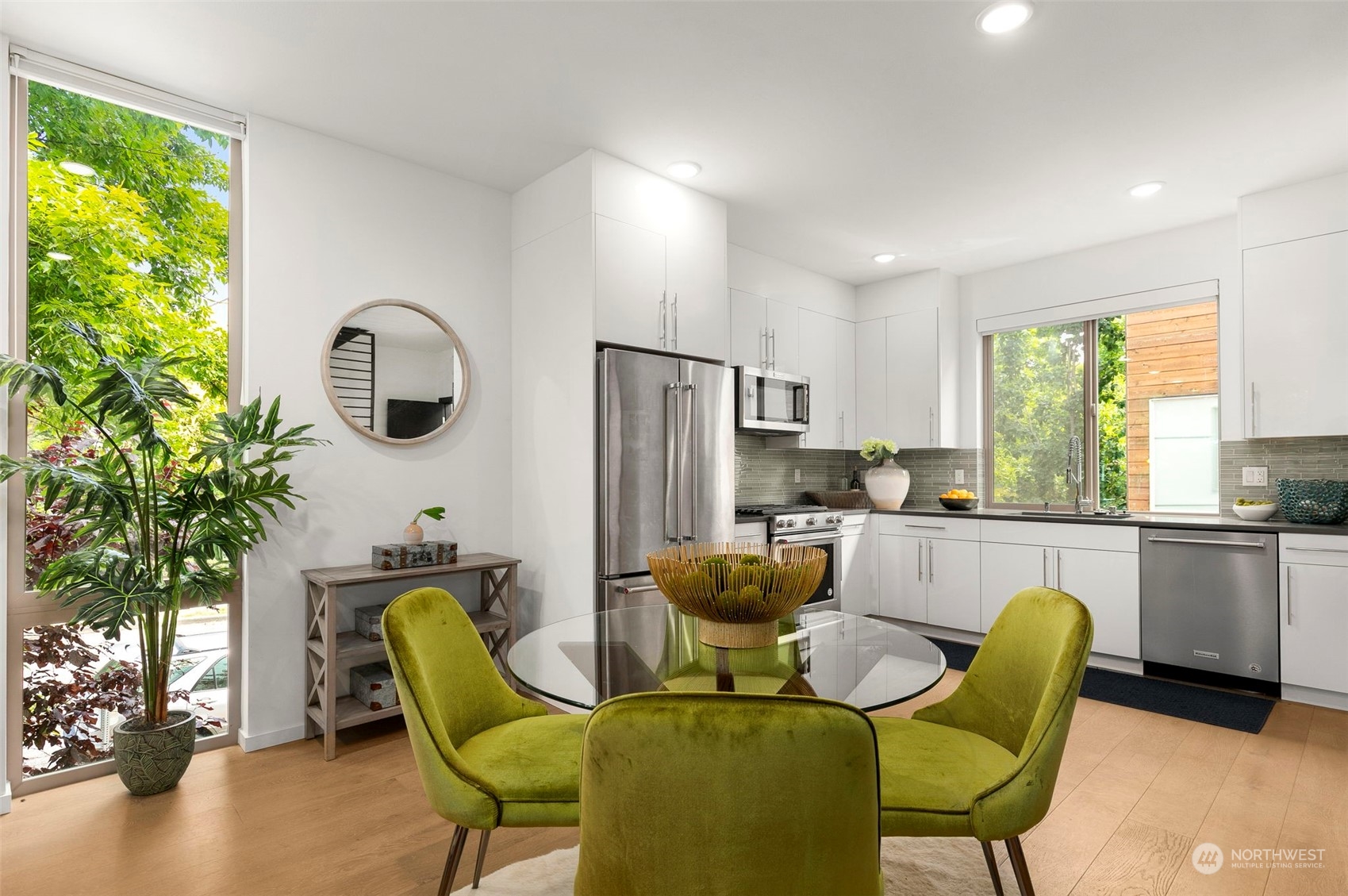 200 20th Avenue South Seattle, WA 98144 - Photo 4 of 22 a living room with furniture a window and kitchen view