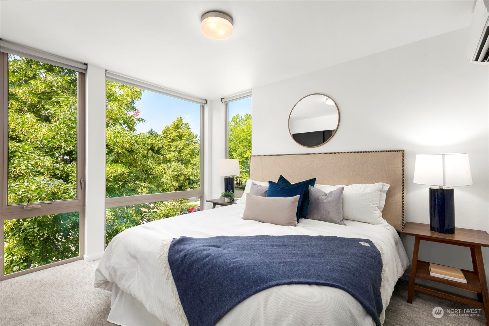 200 20th Avenue South Seattle, WA 98144 - Photo 9 of 22 a bedroom with a large bed and a large window