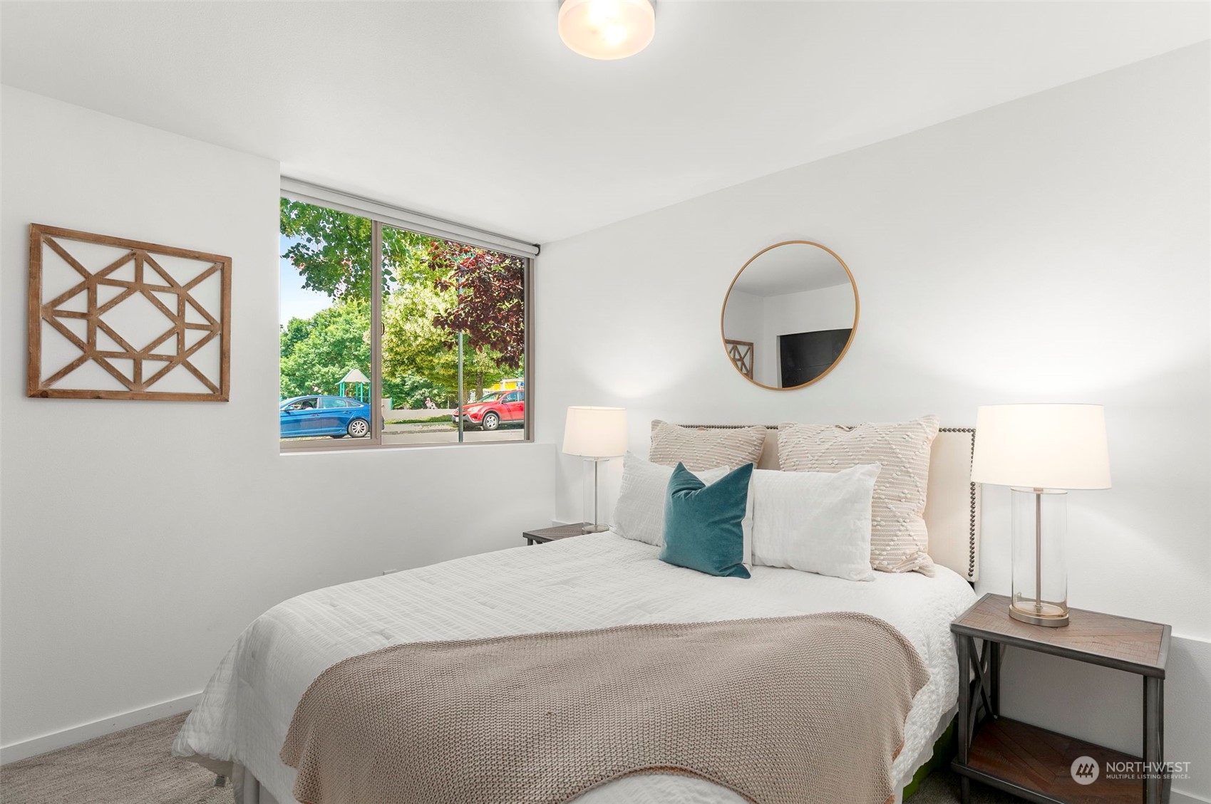 200 20th Avenue South Seattle, WA 98144 - Photo 10 of 22 a bedroom with a bed and a large window