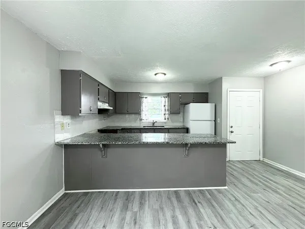 $1,345 | 1720 Southeast Santa Barbara Place, Cape Coral, FL 33990