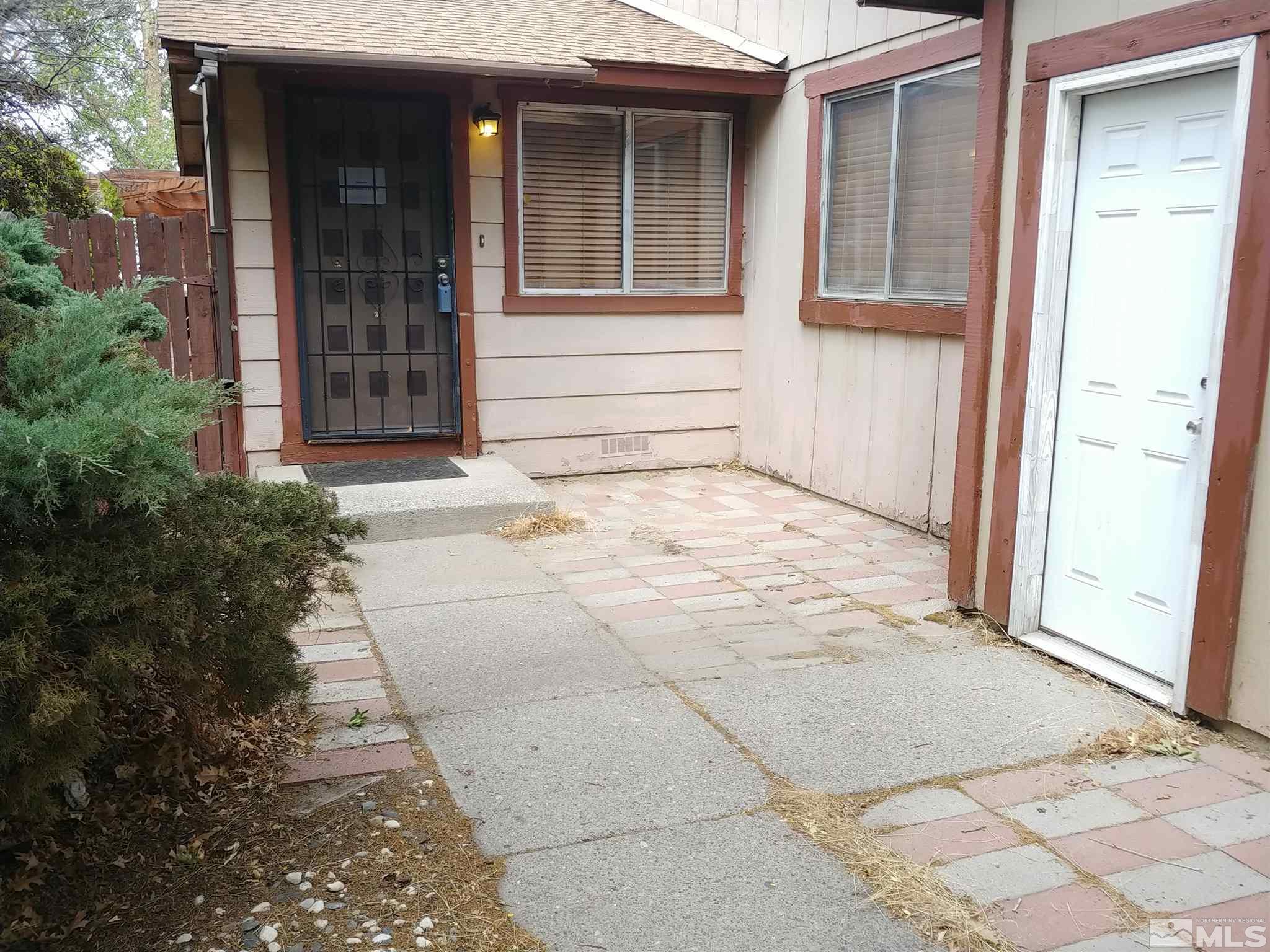6615 Lotus Street Reno, NV 89506 - Photo 3 of 16 a view of entrance front of house