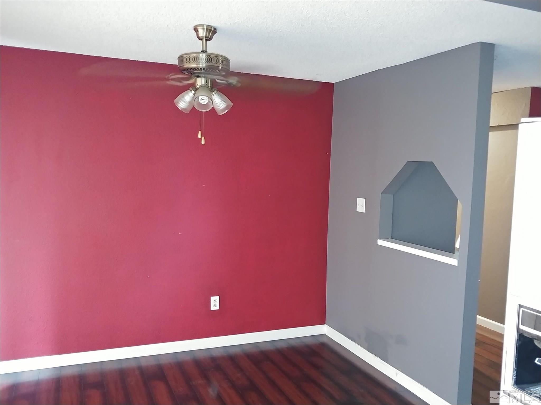 6615 Lotus Street Reno, NV 89506 - Photo 5 of 16 a view of a livingroom with wooden floor