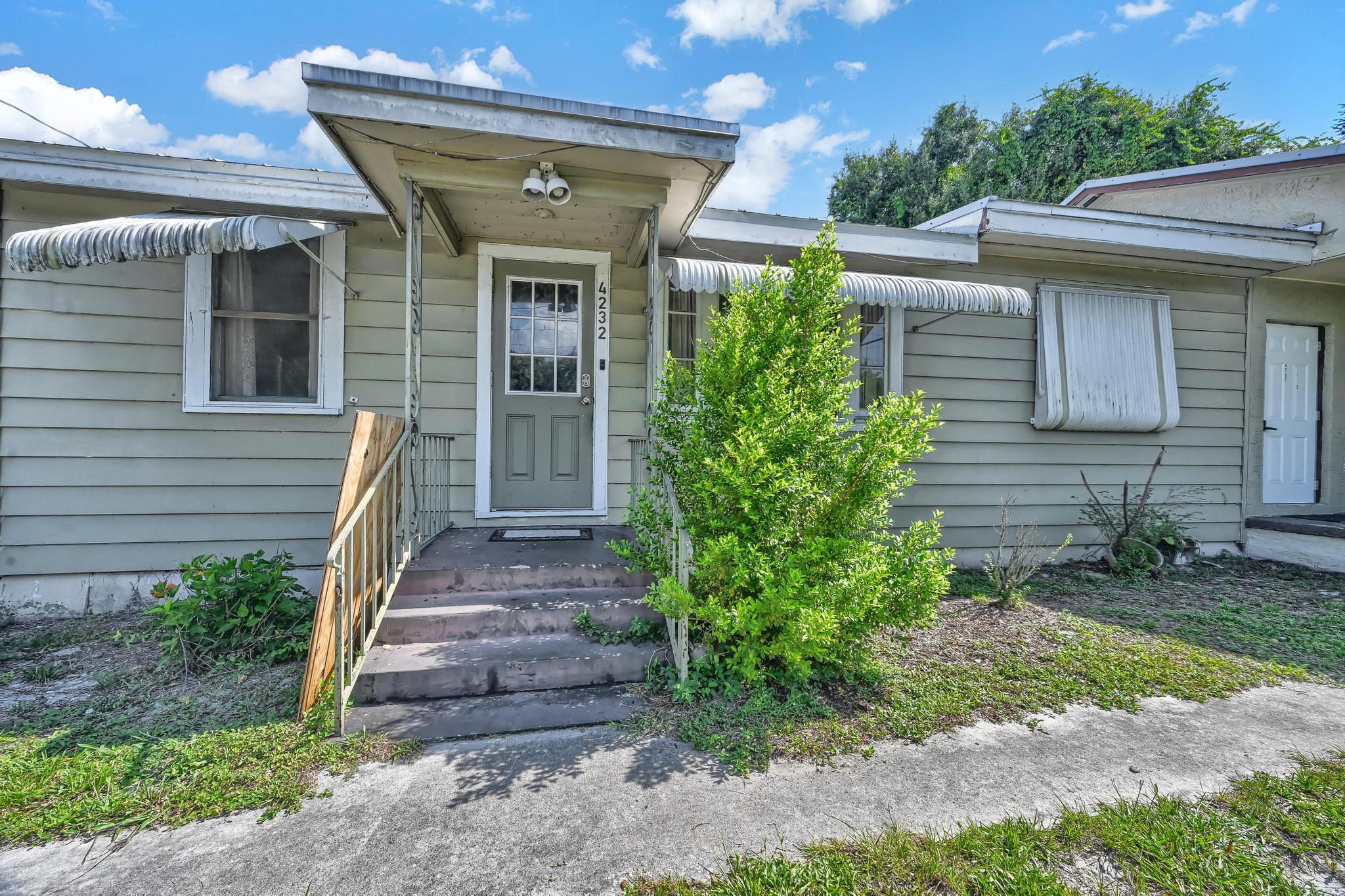 4232 Edwards Road Fort Pierce, FL 34981 - Photo 1 of 17 front of house