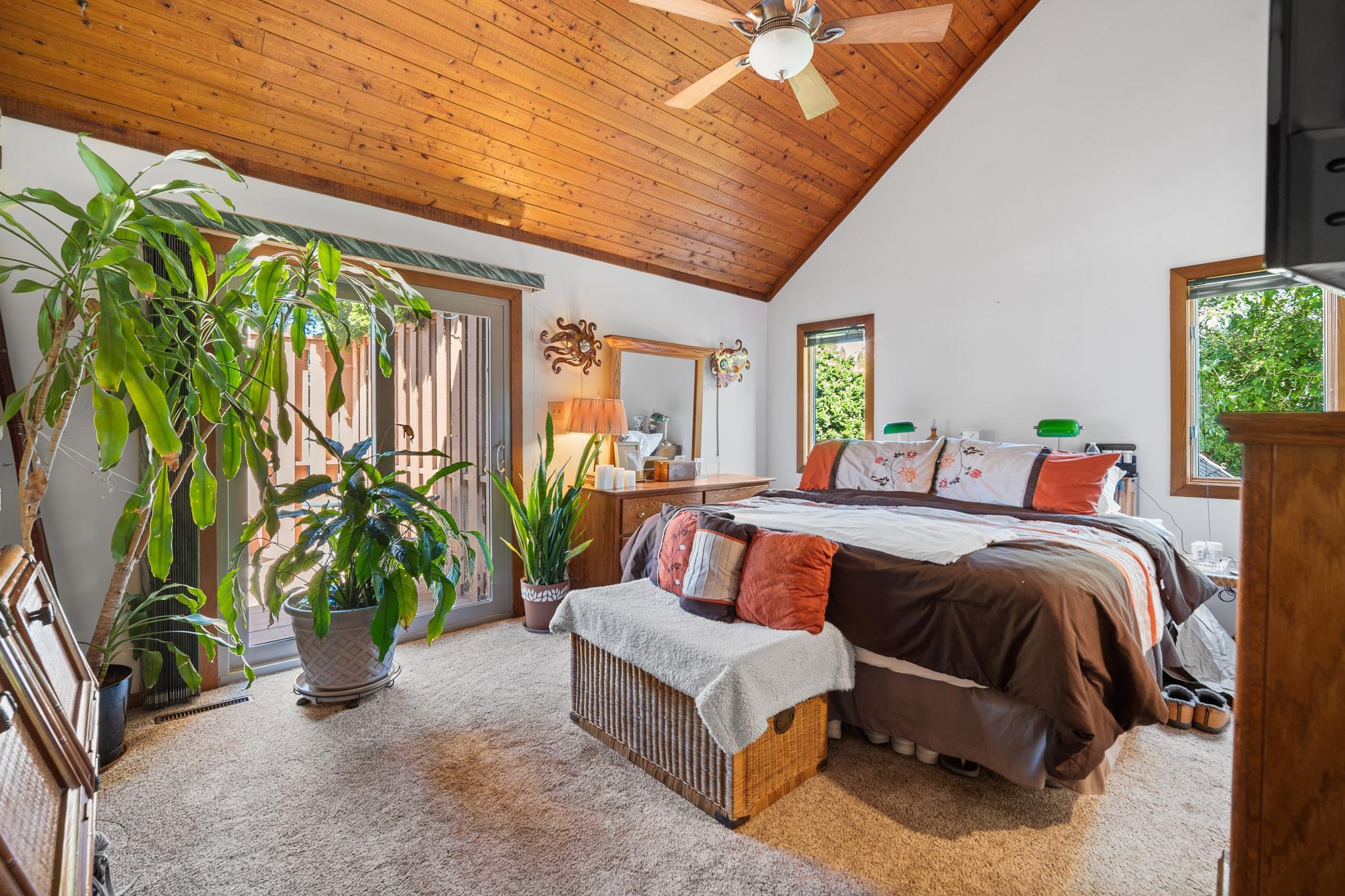 202 N Shore Marmora, NJ 08223 - Photo 14 of 21 a spacious bedroom with a large bed and a potted plant