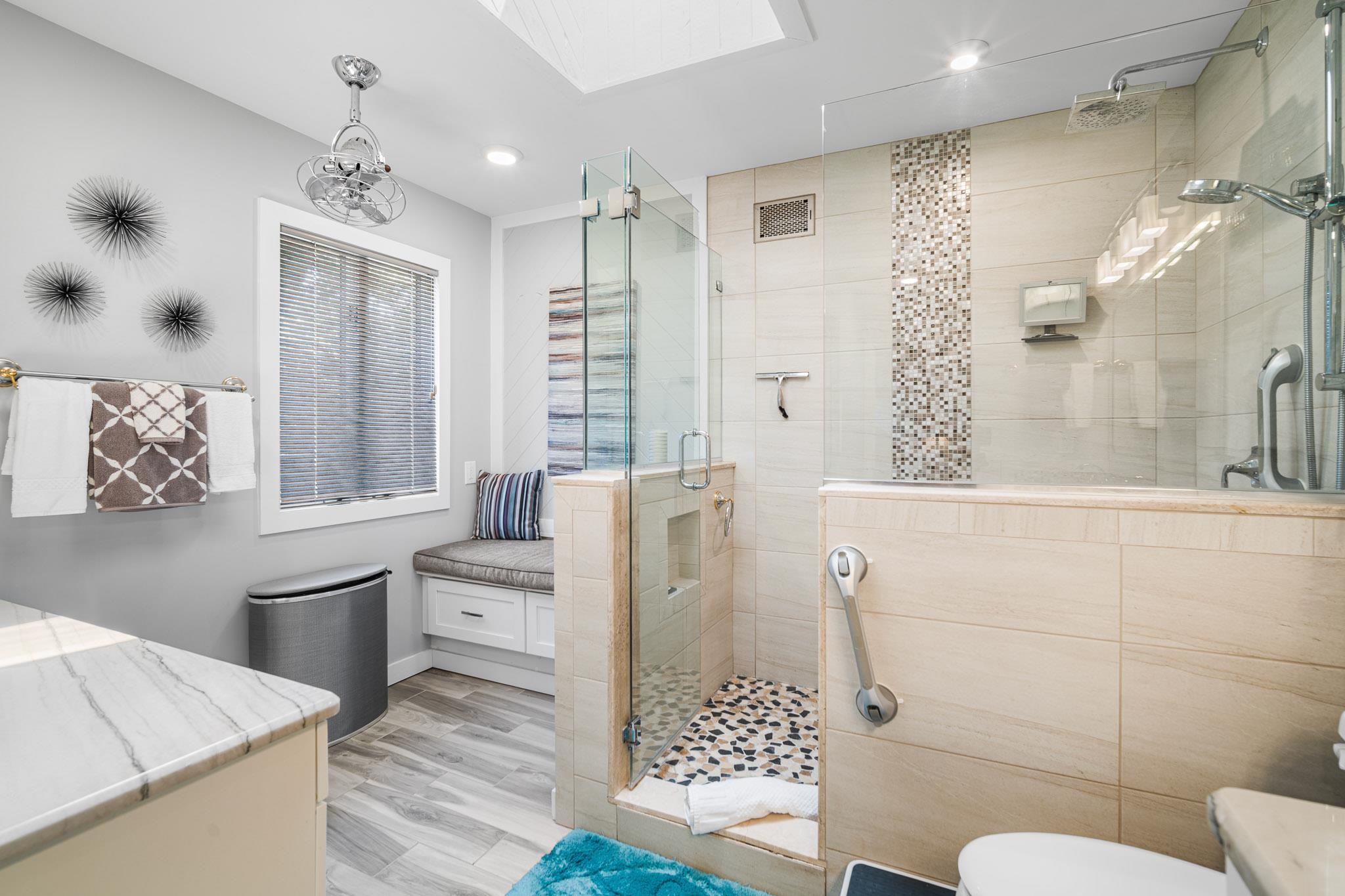 202 N Shore Marmora, NJ 08223 - Photo 15 of 21 a bathroom with a sink a toilet and shower