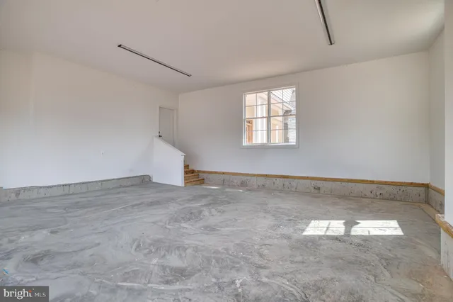 a view of a room with wooden walls