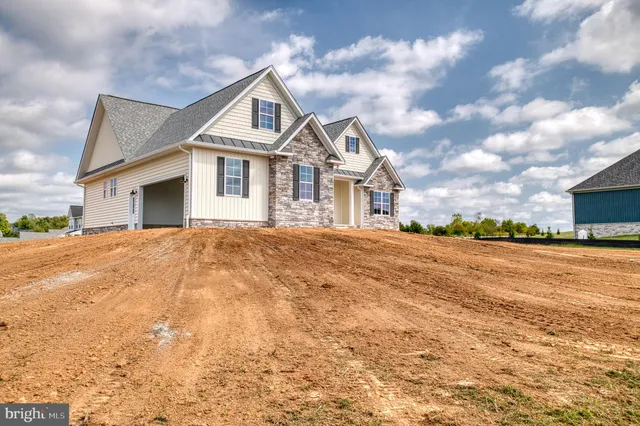 a view of a lake with a garden