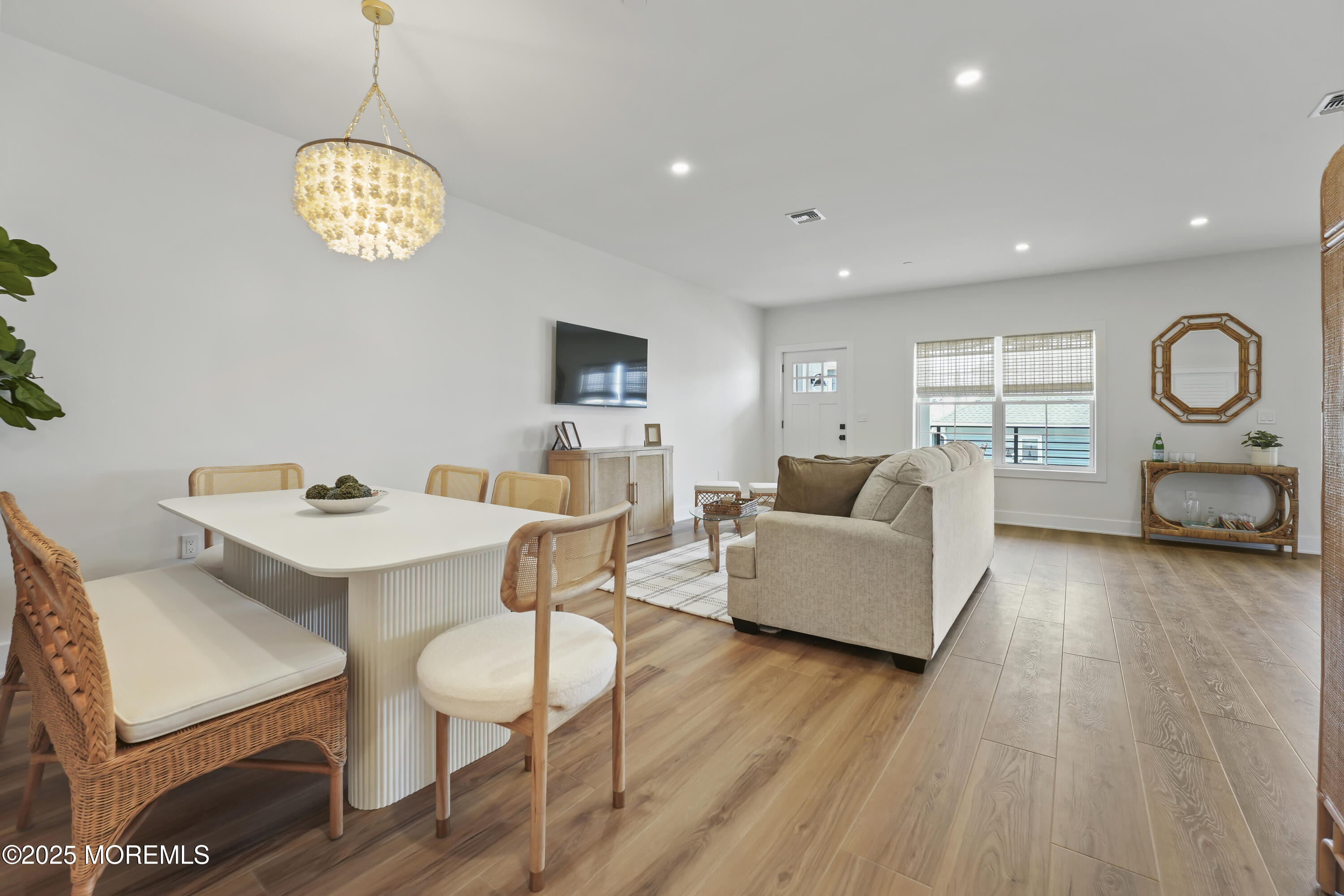 33 Hamilton Avenue, Unit 2 Seaside Heights, NJ 08751 - Photo 11 of 32 a living room with furniture a window and a table