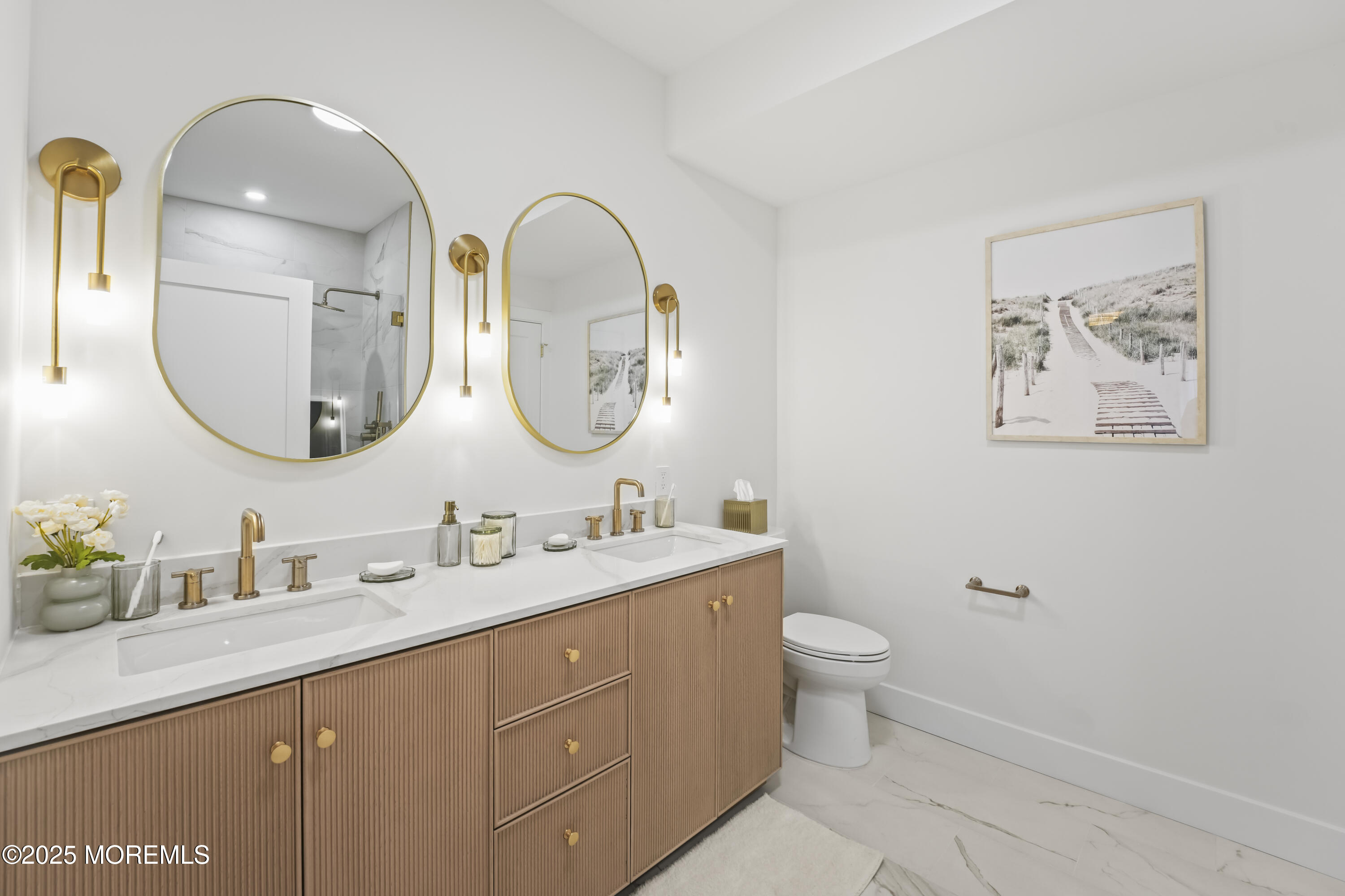 33 Hamilton Avenue, Unit 2 Seaside Heights, NJ 08751 - Photo 16 of 32 a bathroom with 2 sink and a mirror