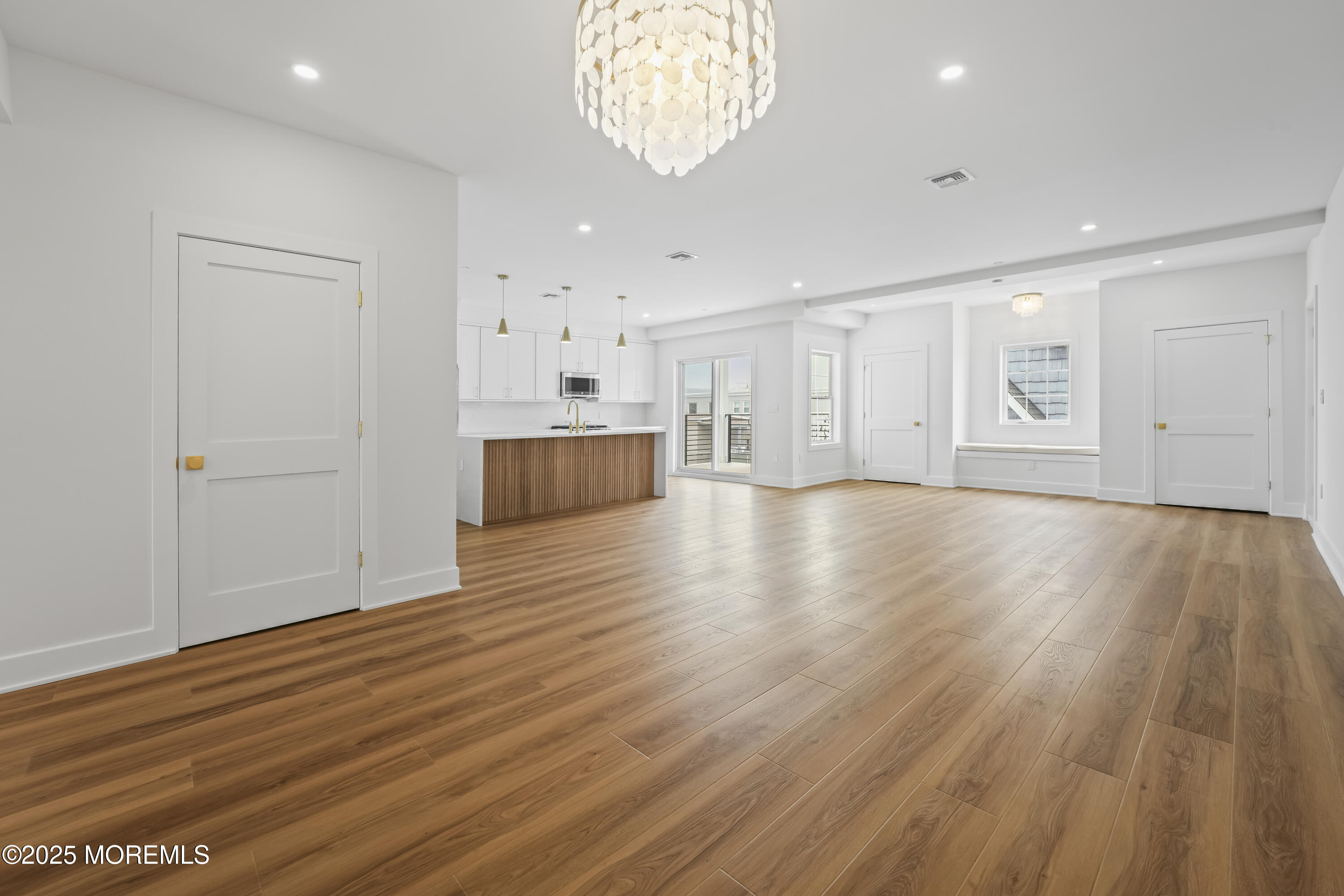 33 Hamilton Avenue, Unit 2 Seaside Heights, NJ 08751 - Photo 26 of 32 a view of empty room with wooden floor
