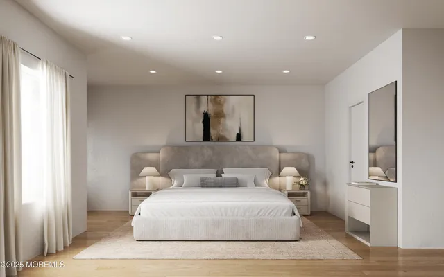 a bedroom with a bed and a night stand