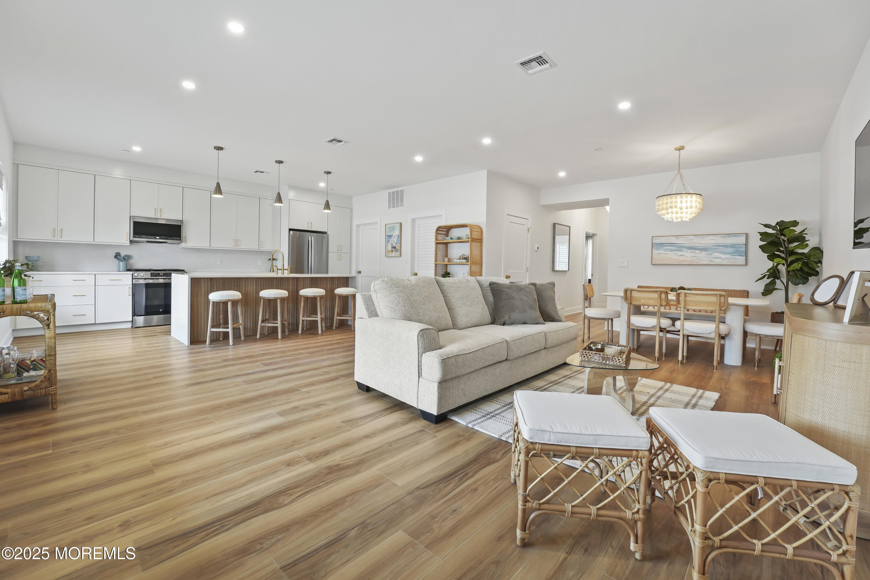 33 Hamilton Avenue, Unit 2 Seaside Heights, NJ 08751 - Photo 5 of 32 a living room with furniture and a wooden floor