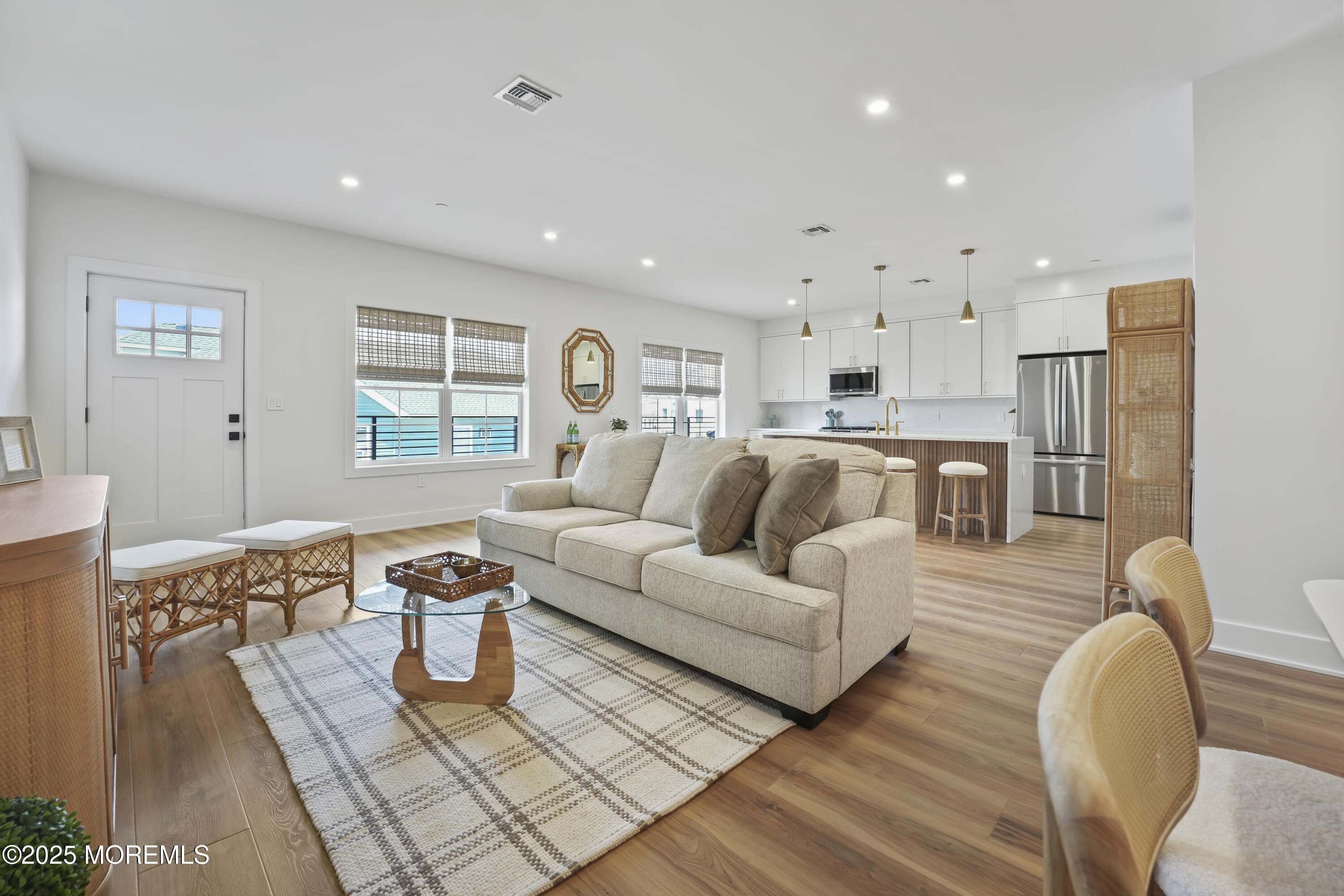33 Hamilton Avenue, Unit 2 Seaside Heights, NJ 08751 - Photo 10 of 32 a living room with furniture and a table