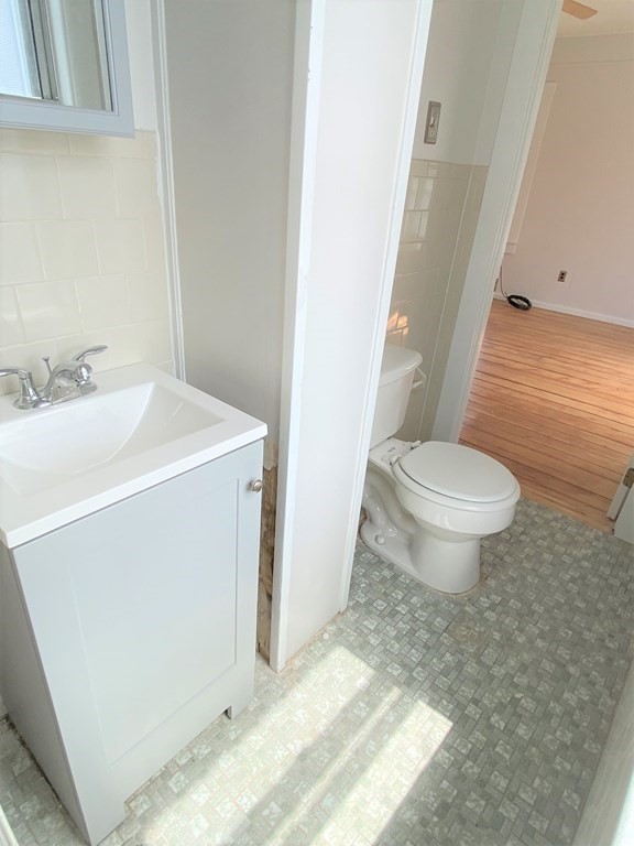 482 Snell Street Fall River, MA 02721 - Photo 11 of 41 a bathroom with a sink toilet and shower
