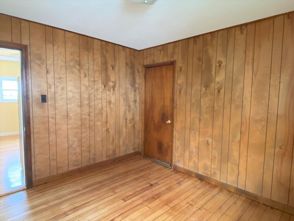 482 Snell Street Fall River, MA 02721 - Photo 15 of 41 a view of a room with wooden floor