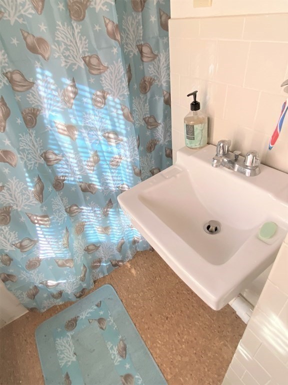 482 Snell Street Fall River, MA 02721 - Photo 30 of 41 a bathroom with a sink