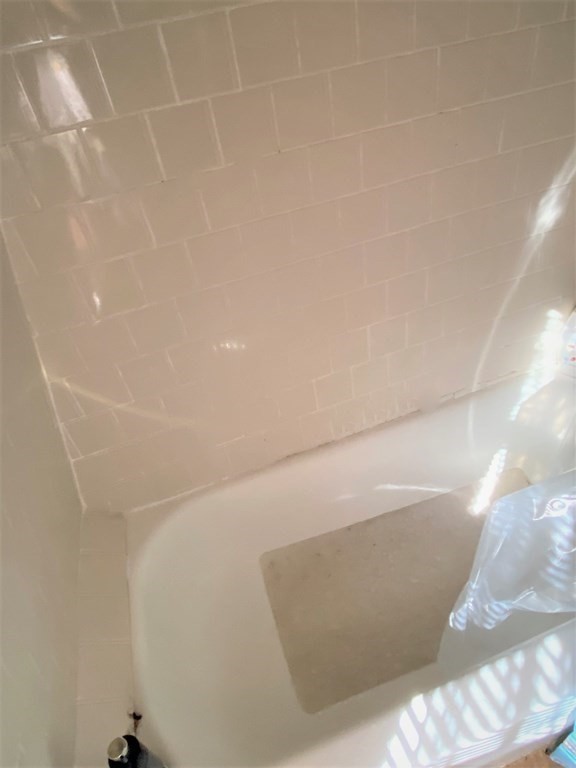 482 Snell Street Fall River, MA 02721 - Photo 31 of 41 a view of a bathtub in a bathroom