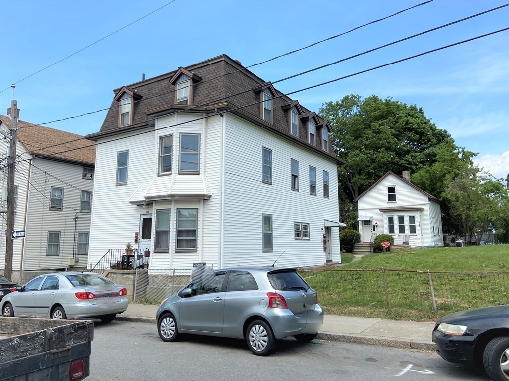 482 Snell Street Fall River, MA 02721 - Photo 34 of 41 a car parked in front of a house