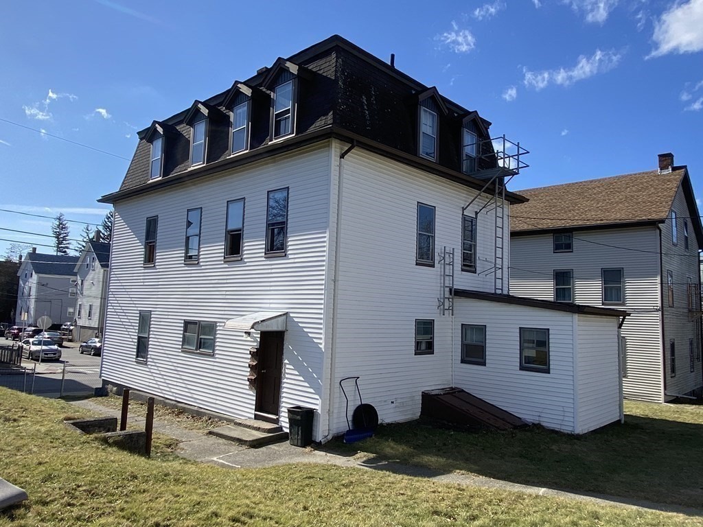 482 Snell Street Fall River, MA 02721 - Photo 35 of 41 a view of a house with a yard