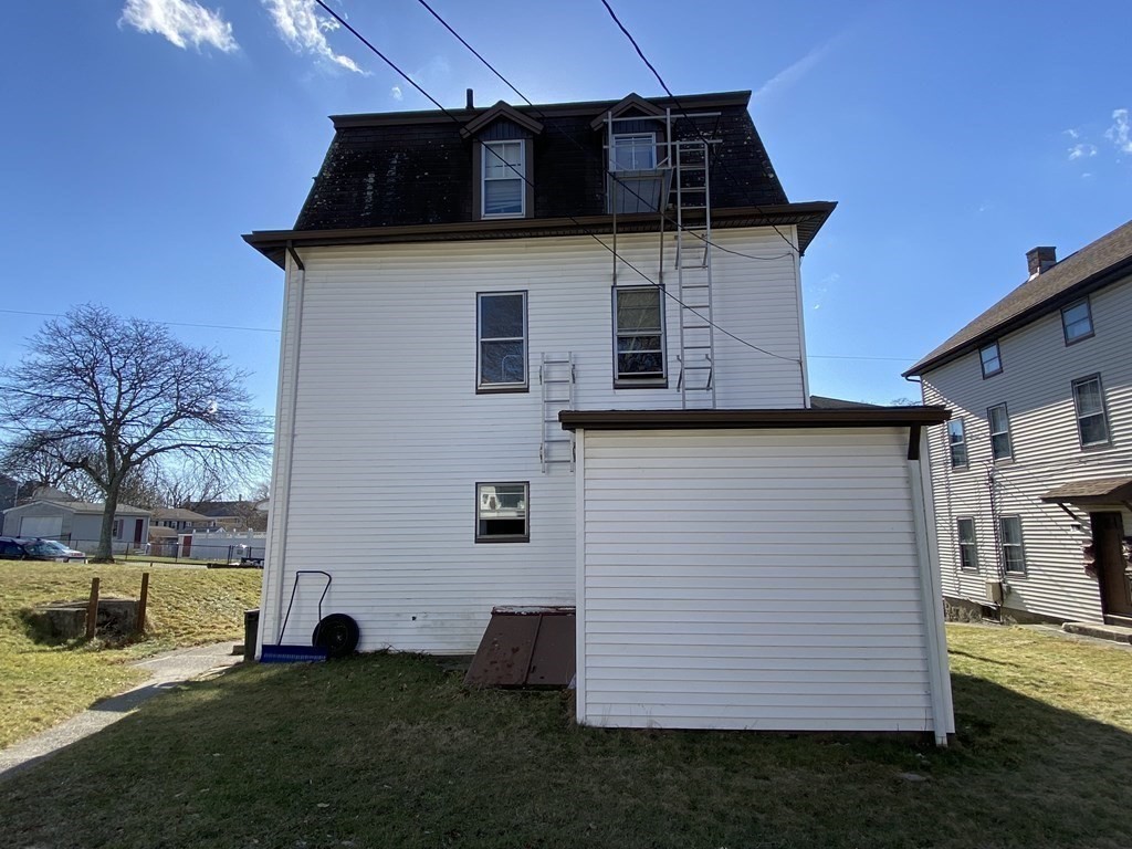 482 Snell Street Fall River, MA 02721 - Photo 36 of 41 a view of a house with a yard