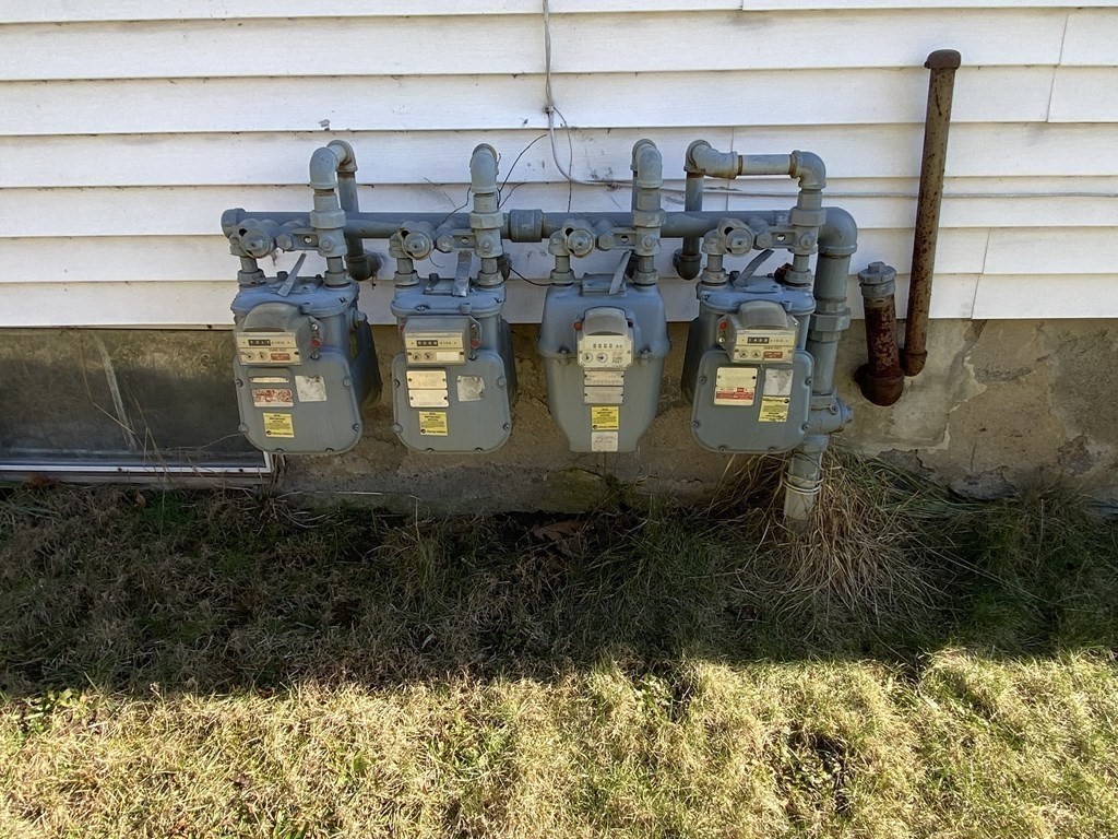 482 Snell Street Fall River, MA 02721 - Photo 38 of 41 a view of water heater room