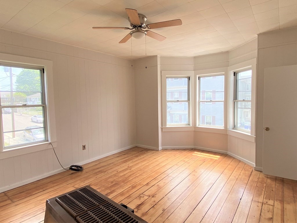 482 Snell Street Fall River, MA 02721 - Photo 4 of 41 a view of an empty room with a window