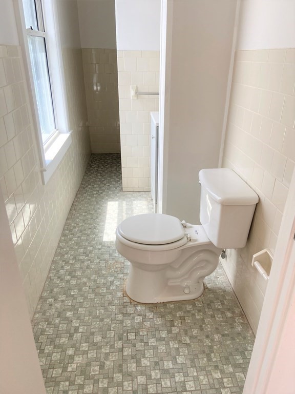482 Snell Street Fall River, MA 02721 - Photo 8 of 41 a bathroom with a toilet and a shower