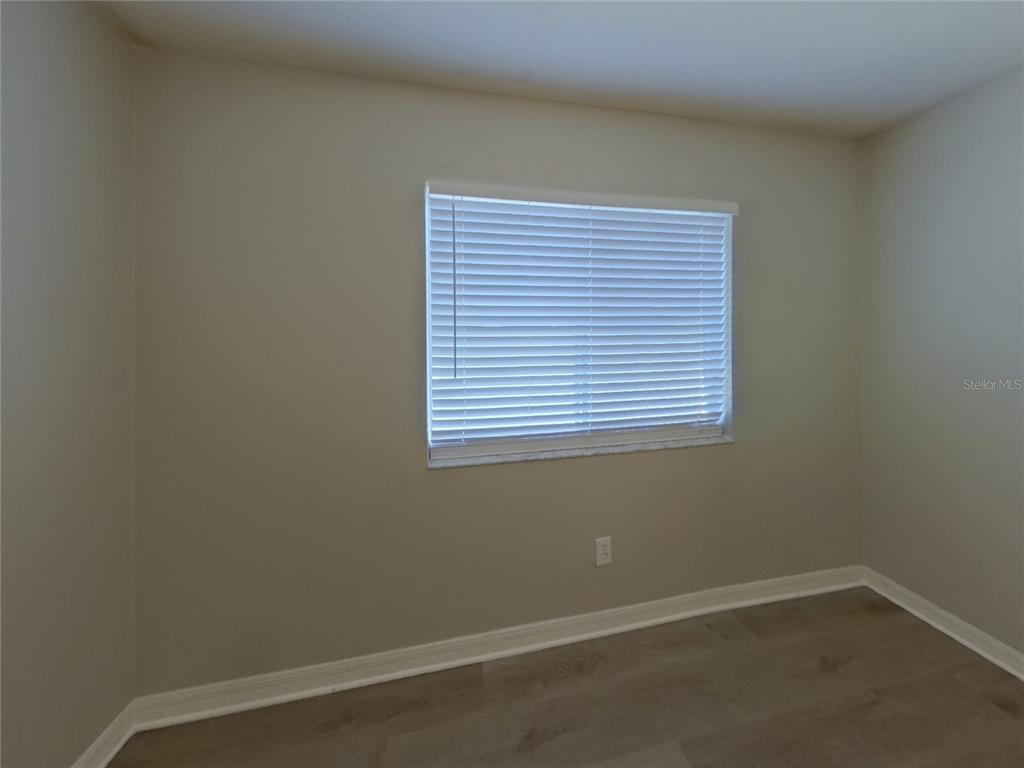 Undisclosed Address Wesley Chapel, FL 33545 - Photo 13 of 17 an empty room with a window