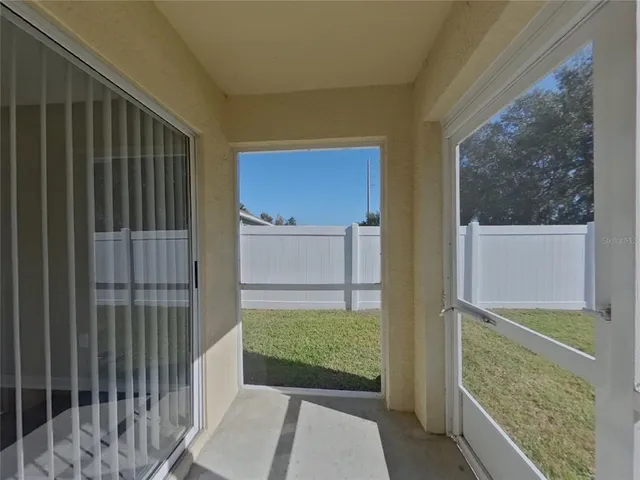 a balcony view with an outdoor space