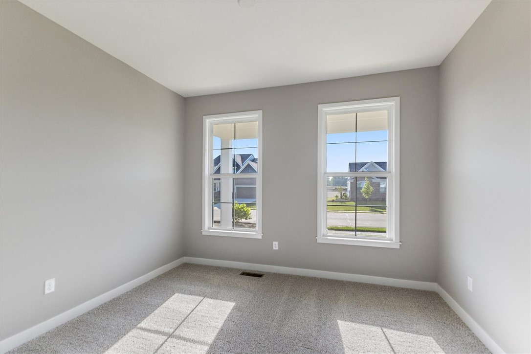 407 South Landon Lane Springfield, OH 45502 - Photo 16 of 30 This naturally illuminated room offers plush carpeting and a view of the quiet neighborhood.