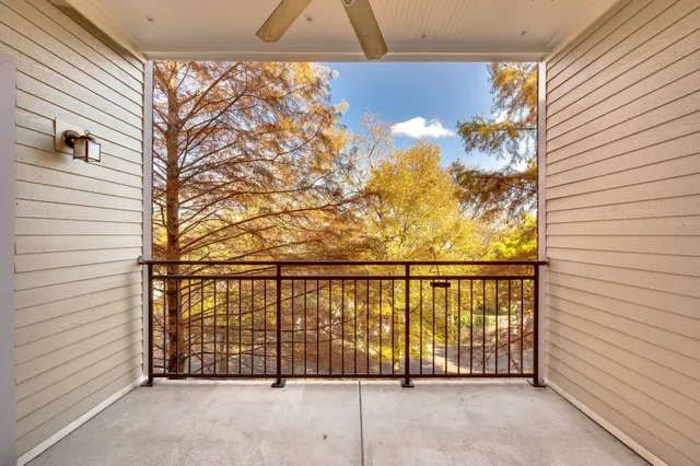 a view of a backyard with sitting area