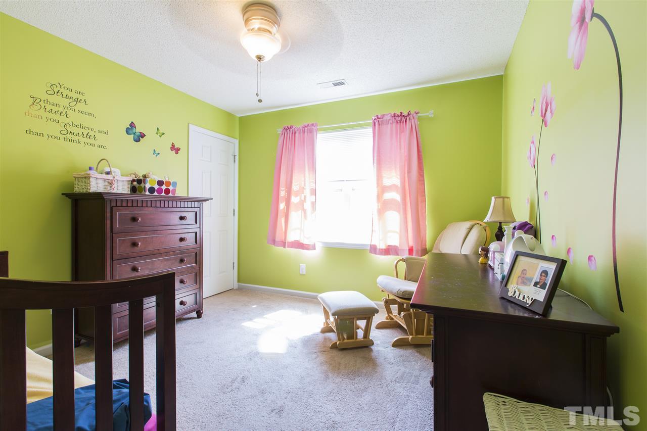 5302 Interlock Drive Raleigh, NC 27610 - Photo 14 of 19 a living room with furniture and a window