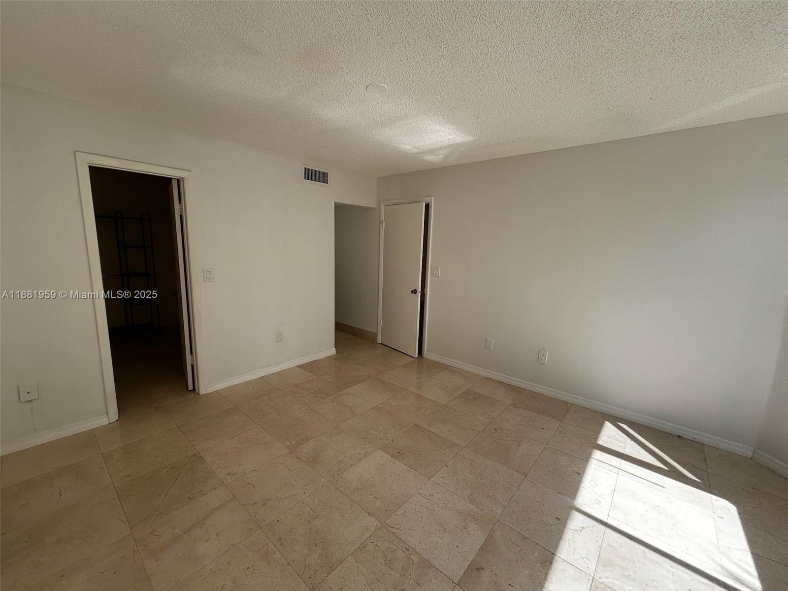 7451 Northwest 16th Street, Unit 304 Plantation, FL 33313 - Photo 25 of 59 a view of an empty room