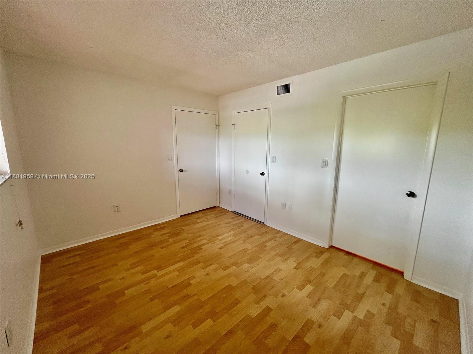 7451 Northwest 16th Street, Unit 304 Plantation, FL 33313 - Photo 32 of 59 a view of empty room