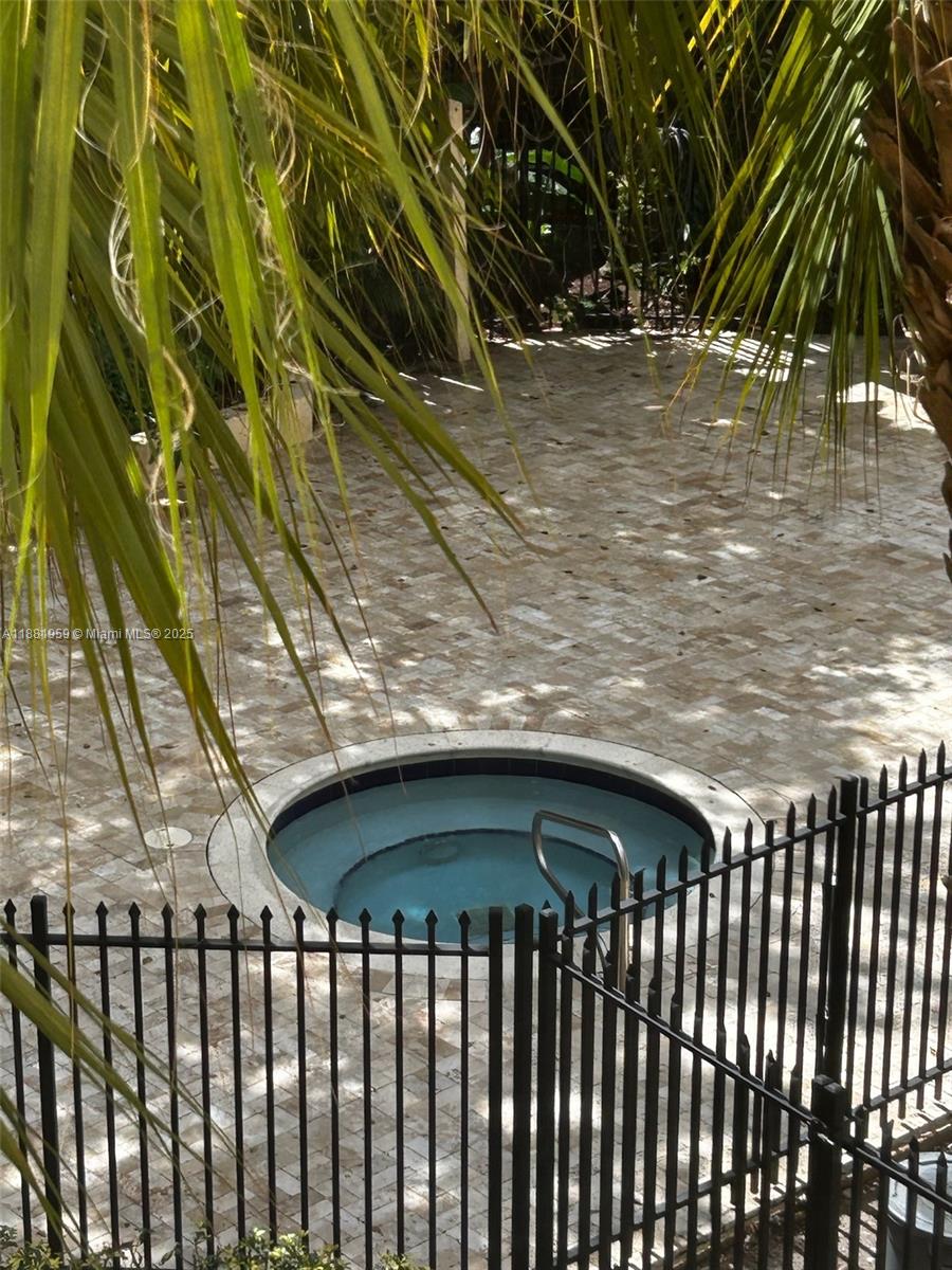 7451 Northwest 16th Street, Unit 304 Plantation, FL 33313 - Photo 46 of 59 a view of backyard with wooden deck