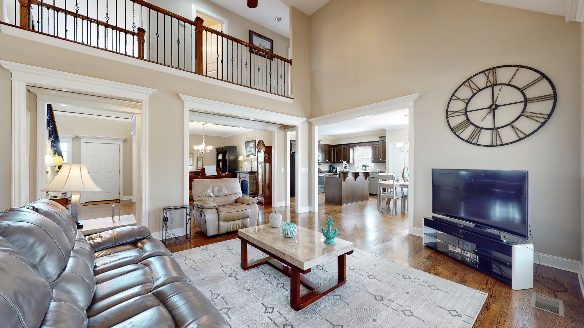 209 Hunters Ridge Drive Tullahoma, TN 37388 - Photo 11 of 54 a living room with furniture a flat screen tv and a fireplace