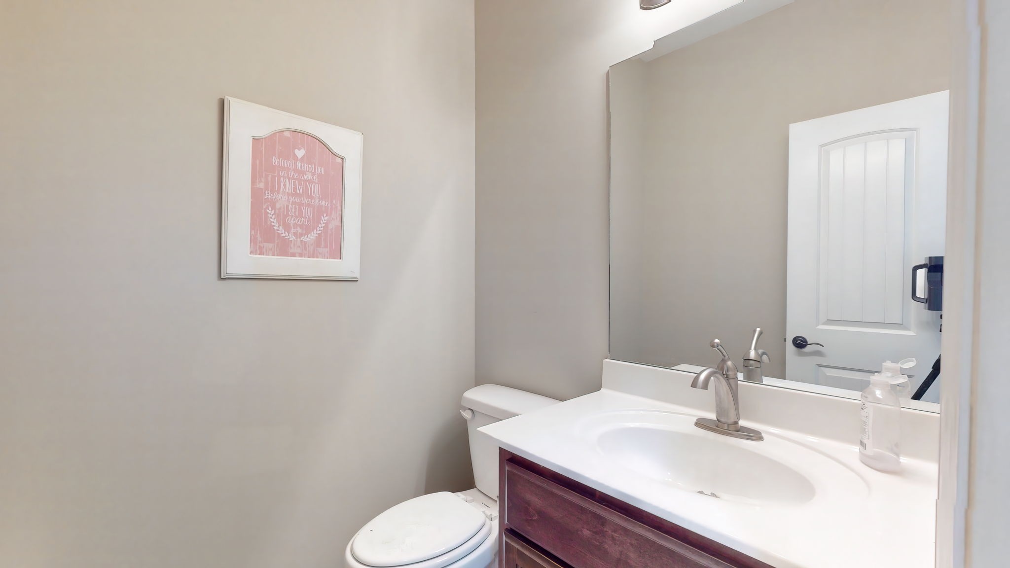 209 Hunters Ridge Drive Tullahoma, TN 37388 - Photo 25 of 54 a bathroom with a sink toilet and vanity