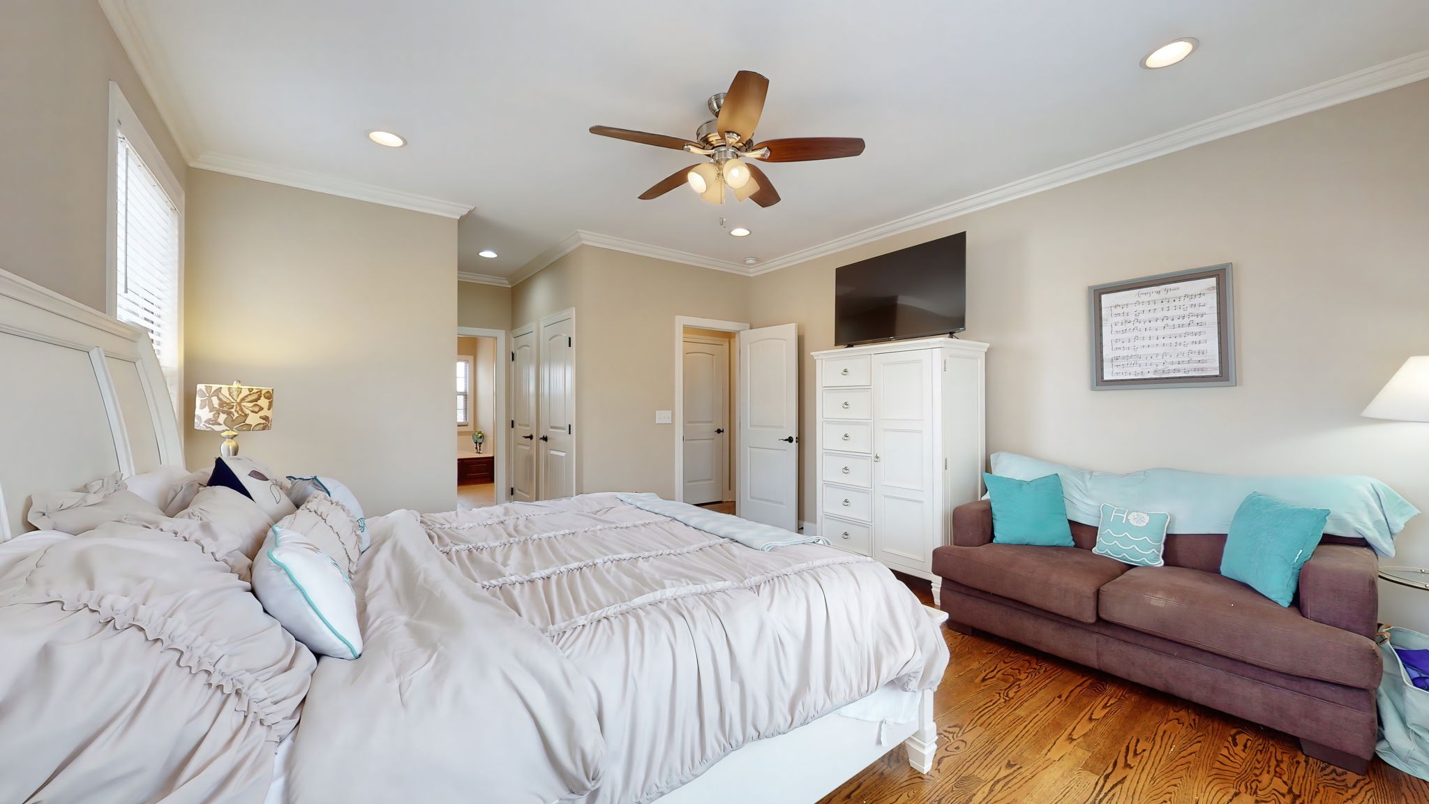 209 Hunters Ridge Drive Tullahoma, TN 37388 - Photo 29 of 54 a bedroom with a bed and ceiling fan