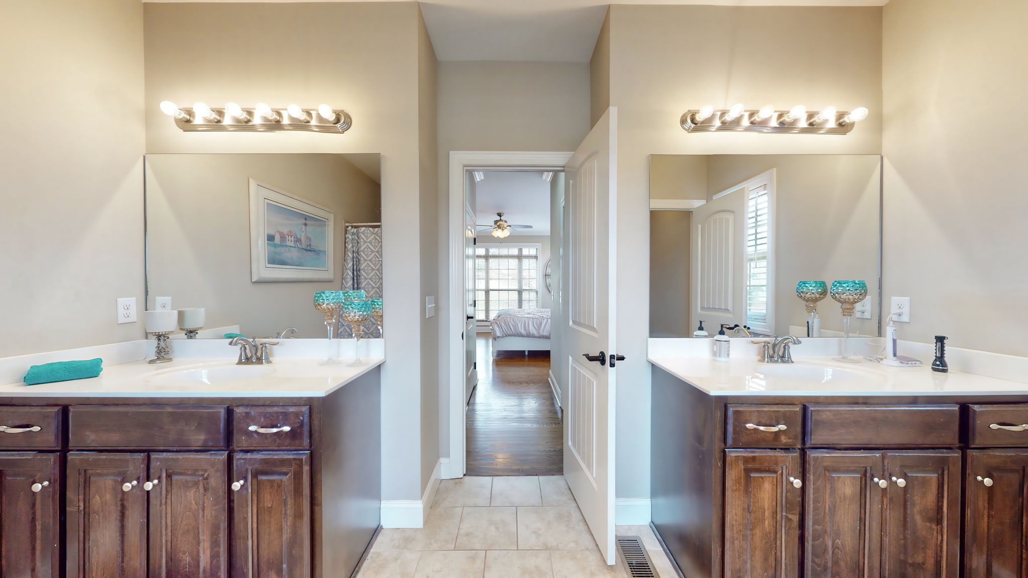209 Hunters Ridge Drive Tullahoma, TN 37388 - Photo 34 of 54 a en suite bathroom with a double vanity sink and a mirror