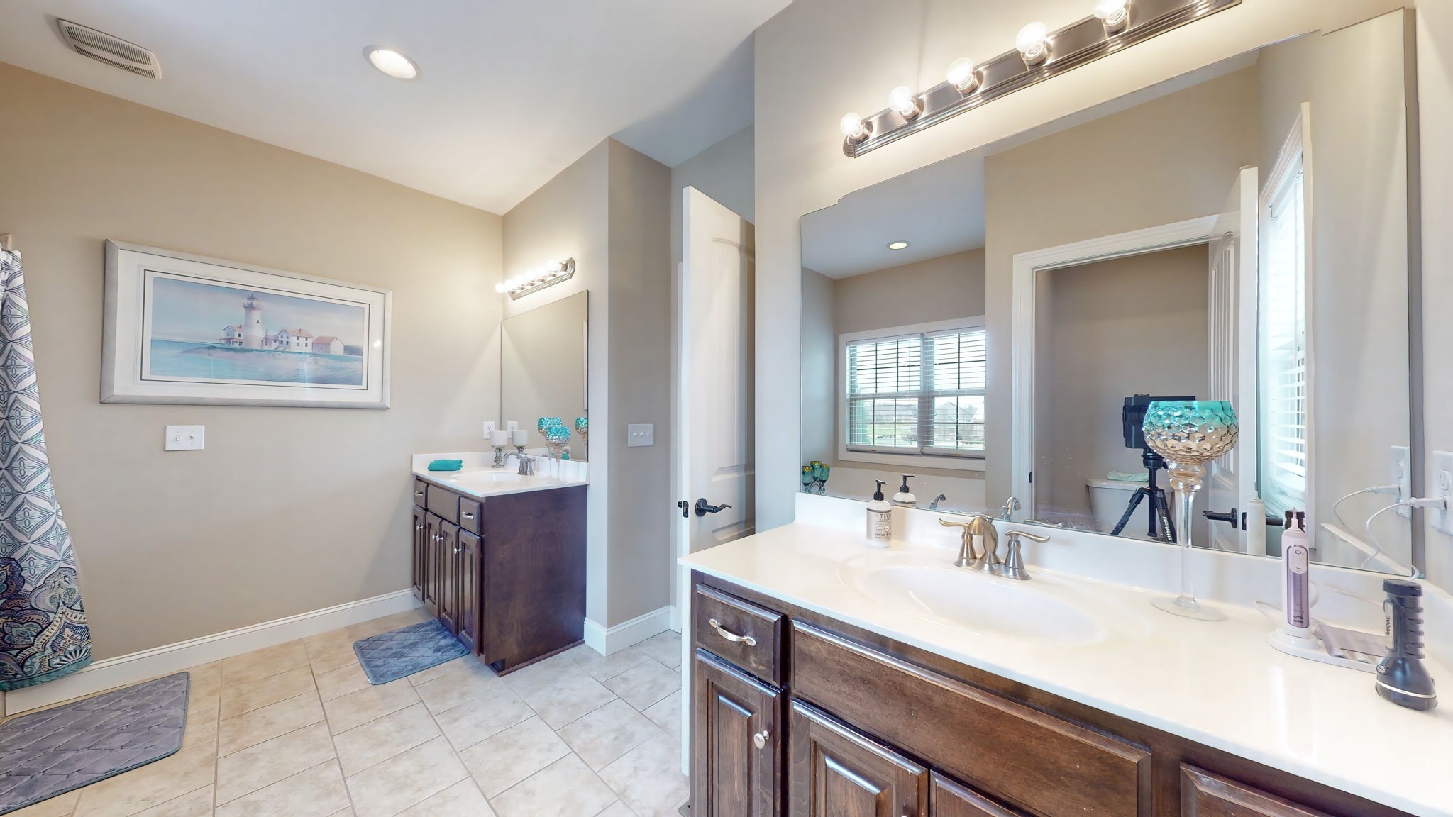 209 Hunters Ridge Drive Tullahoma, TN 37388 - Photo 35 of 54 a bathroom with a sink and a mirror
