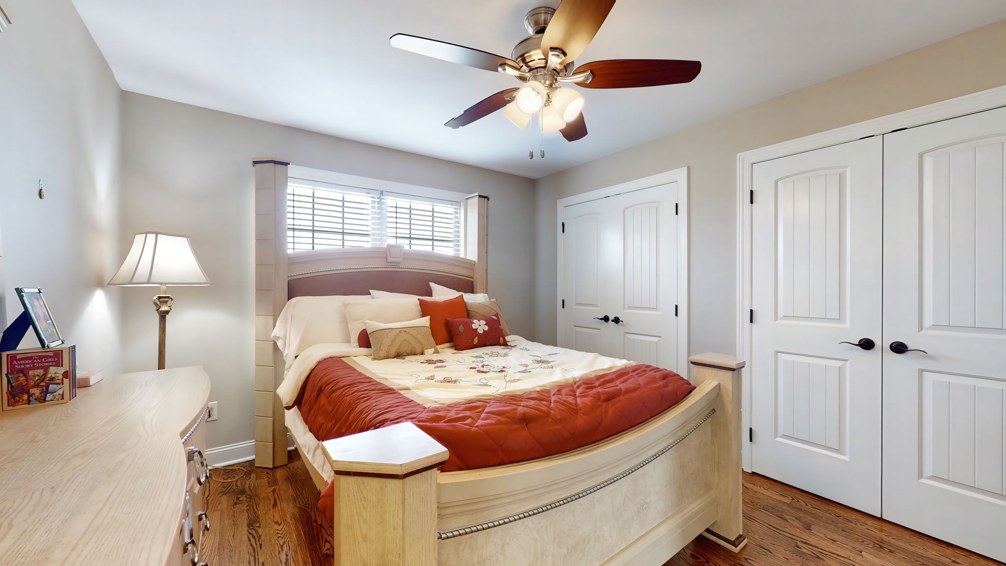 209 Hunters Ridge Drive Tullahoma, TN 37388 - Photo 38 of 54 a bedroom with a bed and a chandelier