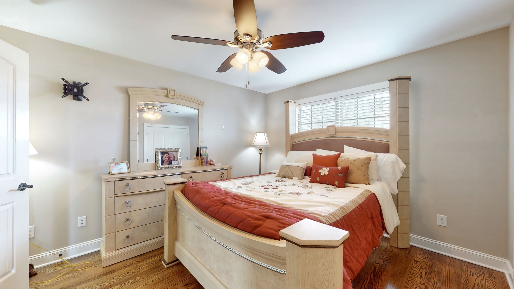209 Hunters Ridge Drive Tullahoma, TN 37388 - Photo 39 of 54 a bedroom with a bed and a chandelier