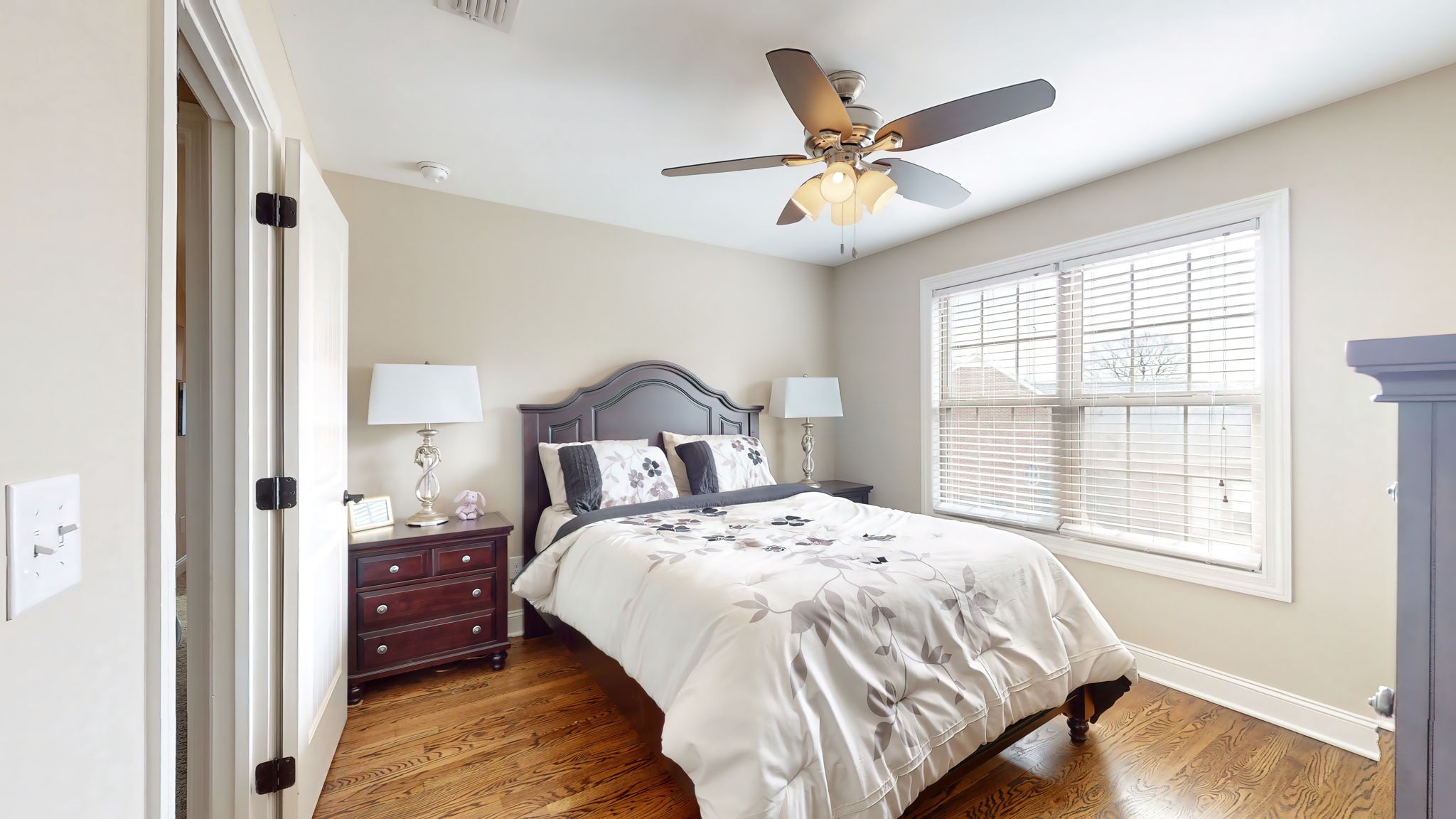 209 Hunters Ridge Drive Tullahoma, TN 37388 - Photo 44 of 54 a bedroom with a large bed and a large window