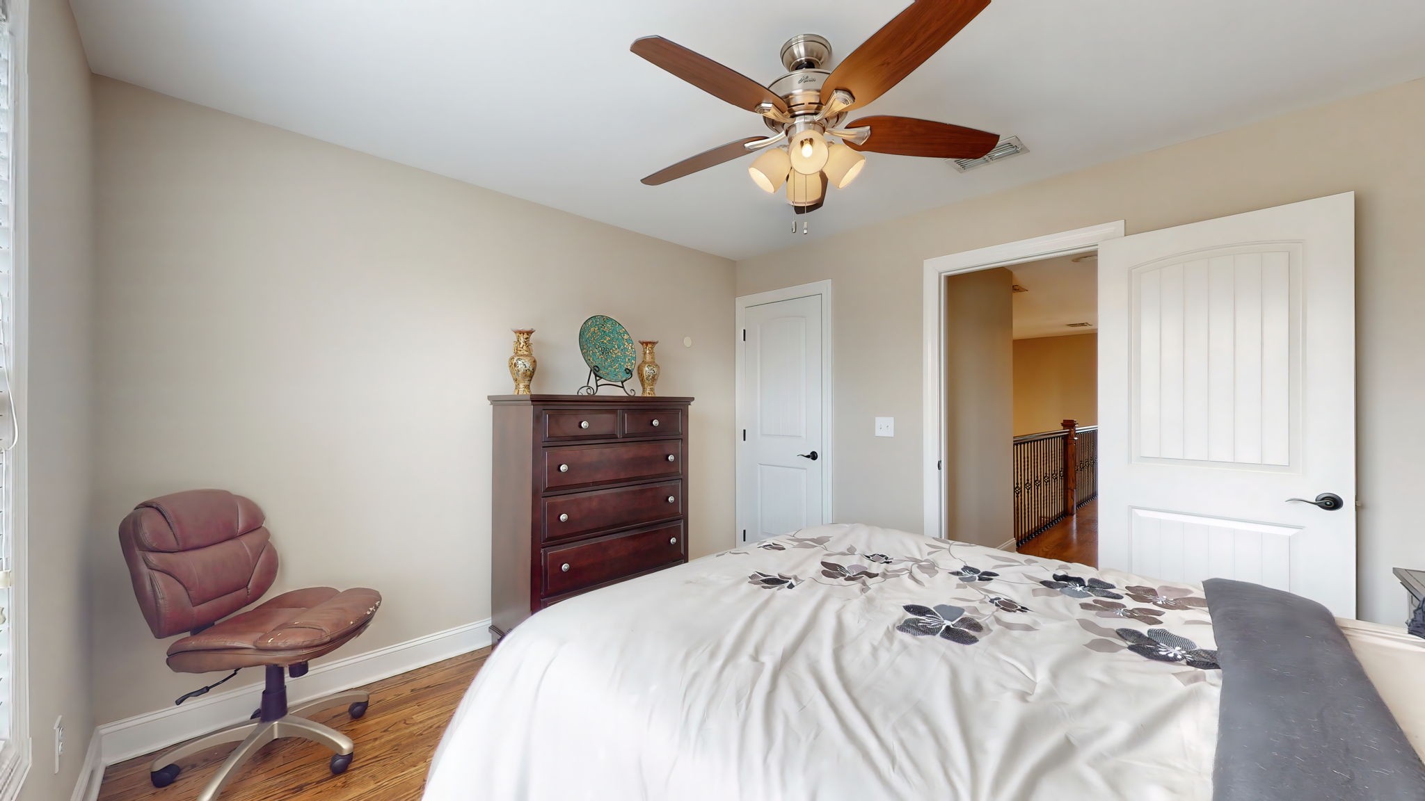 209 Hunters Ridge Drive Tullahoma, TN 37388 - Photo 45 of 54 a bedroom with a bed and cabinets